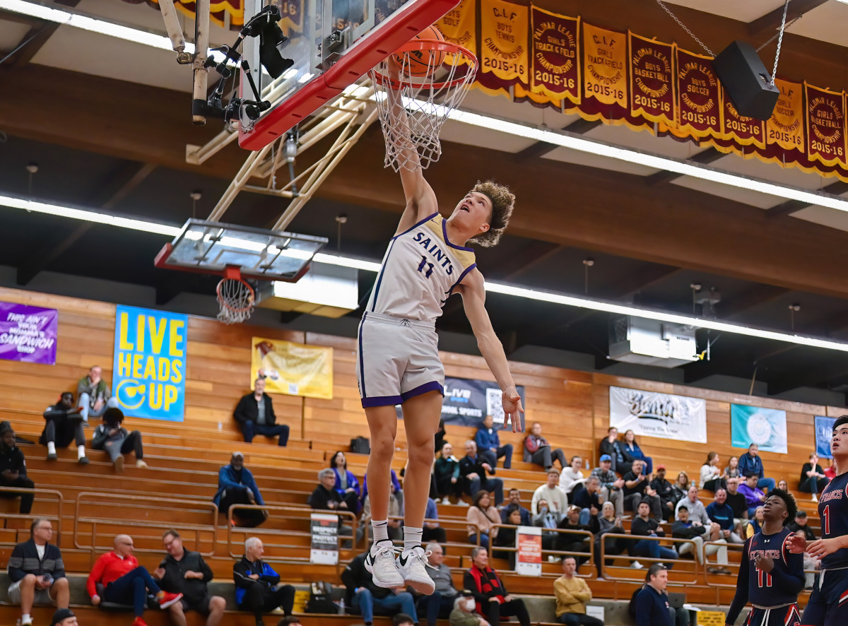 Isaiah Hasten with slam to start the third quarter for St. Augustine. 